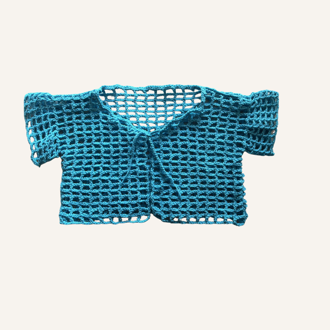 Blue crochet baby sweater on a white background