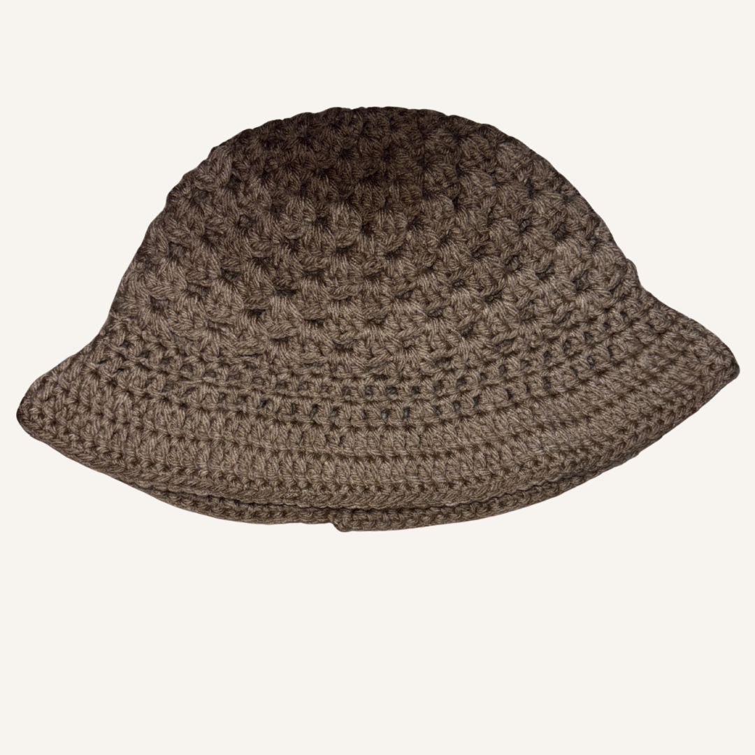 Brown crochet bucket hat on a white background
